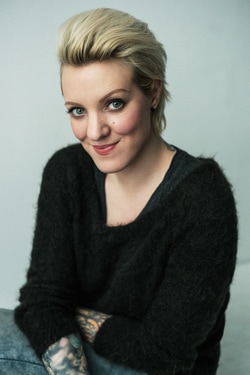 Nika Vaughan Bridal Artist makeup artist Kristina smiling with tattoos and blonde hair