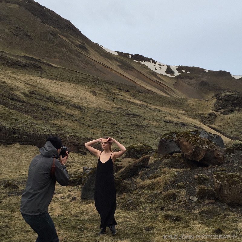 Nika Vaughan Bridal Artists Photographer with model on side of mountain in Iceland